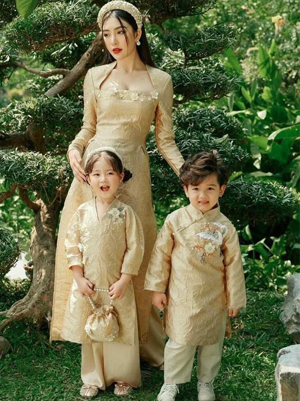 Family Ao Dai celebrates Vietnamese heritage stylish and elegant. aodaistyle